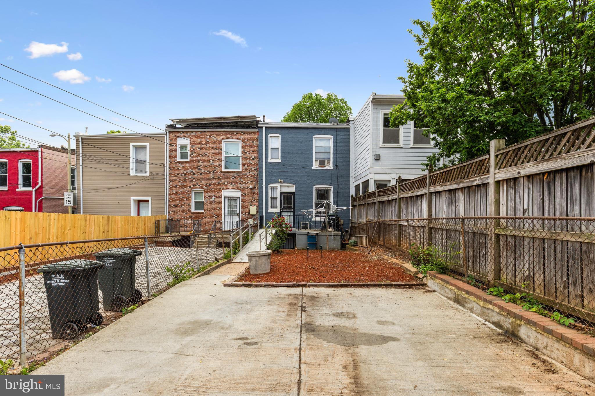 619 Columbia Road Northwest Washington, DC 20001 - Photo 29 of 29 a view of a house with backyard and sitting area