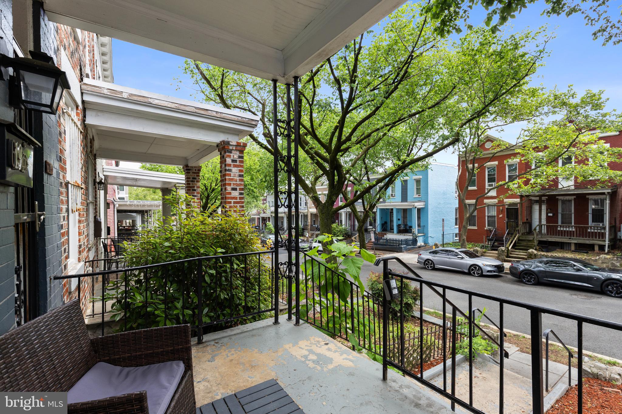619 Columbia Road Northwest Washington, DC 20001 - Photo 6 of 29 a view of a house with a small deck
