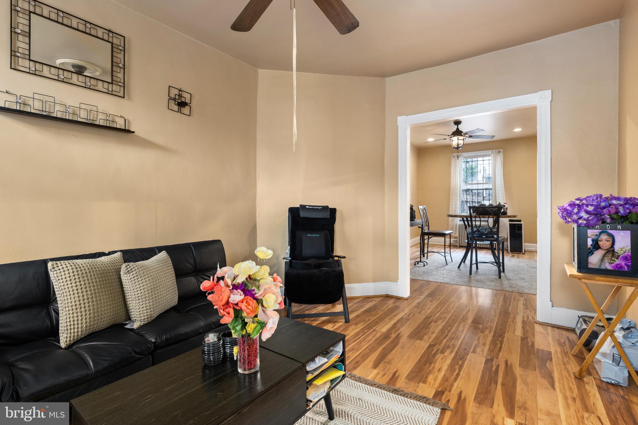 619 Columbia Road Northwest Washington, DC 20001 - Photo 8 of 29 a living room with furniture and wooden floor