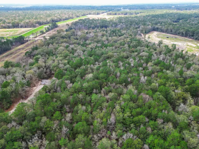 an aerial view of mountain with outdoor space