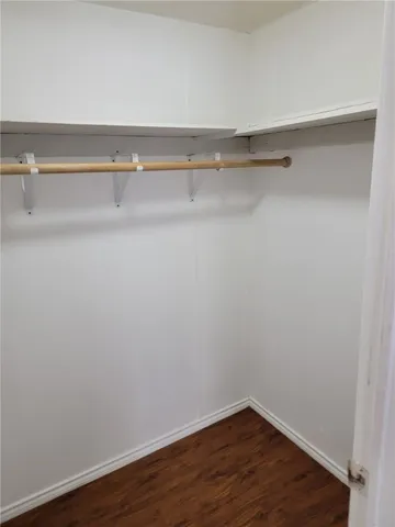 a view of a room with racks on the wall