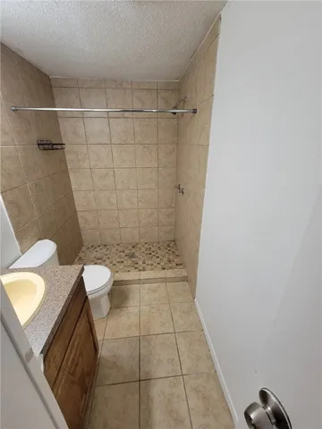 a bathroom with a sink and a shower