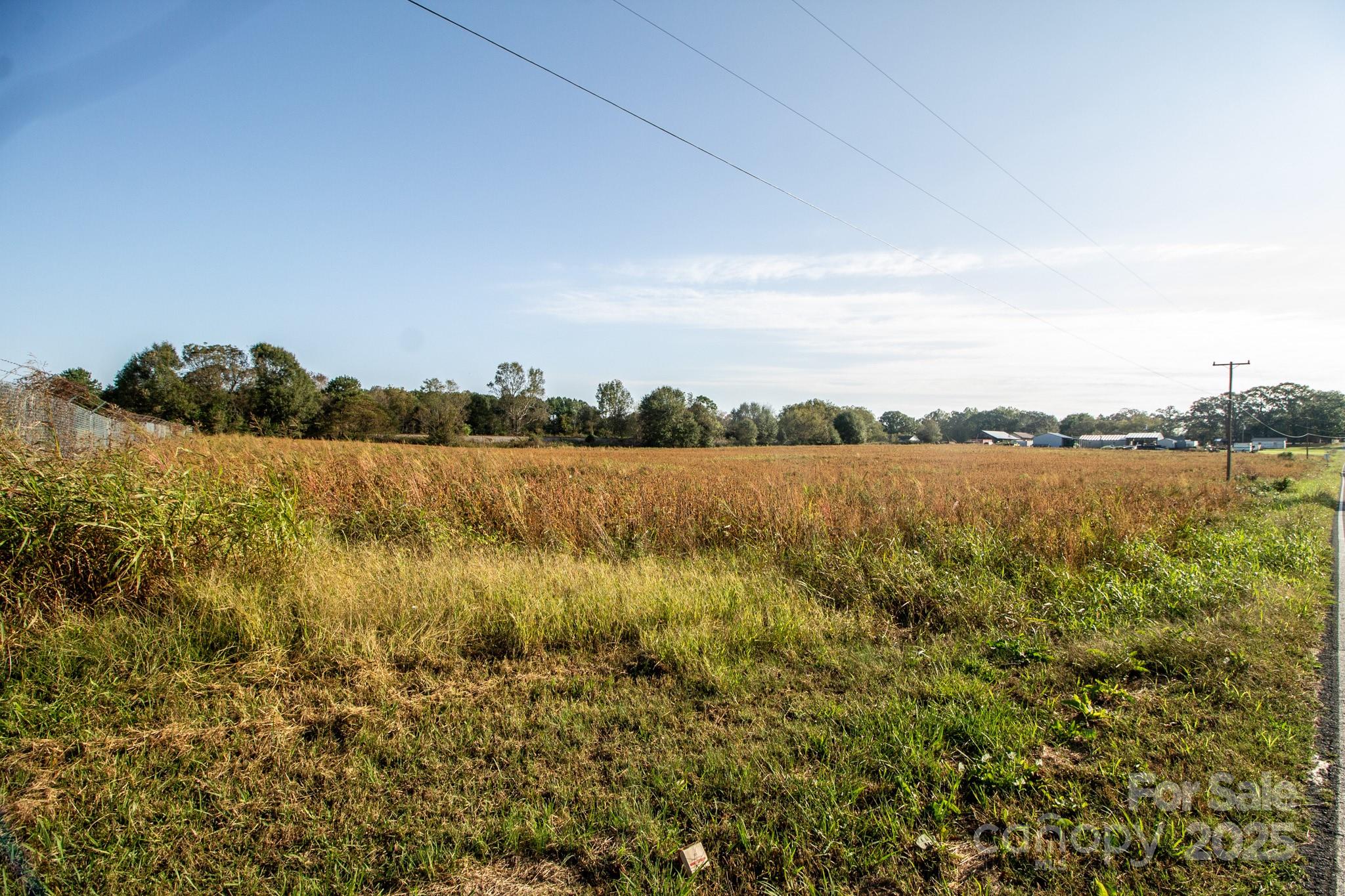 0 Lattimore Road Shelby, NC 28150 - Photo 10 of 22 a view of a lake with houses in the back