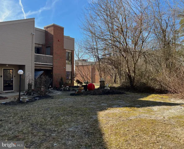 a view of a chairs and tables in the patio