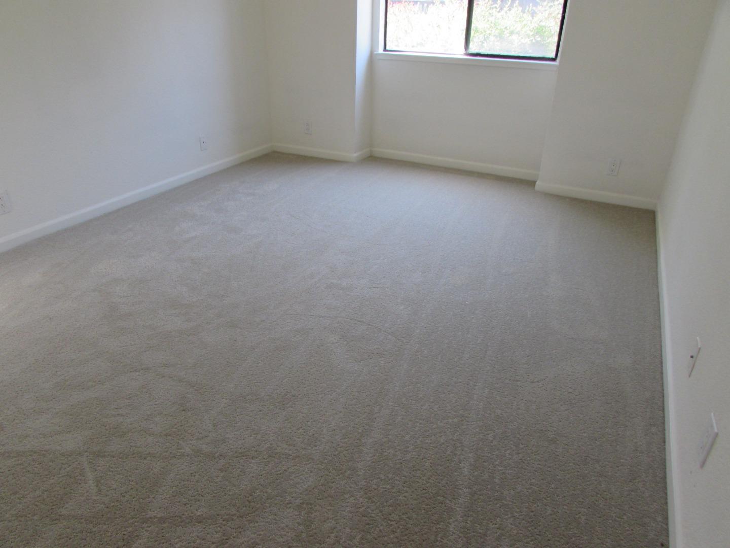 409 Tyler Place, Unit B Salinas, CA 93906 - Photo 14 of 25 an empty room with a window