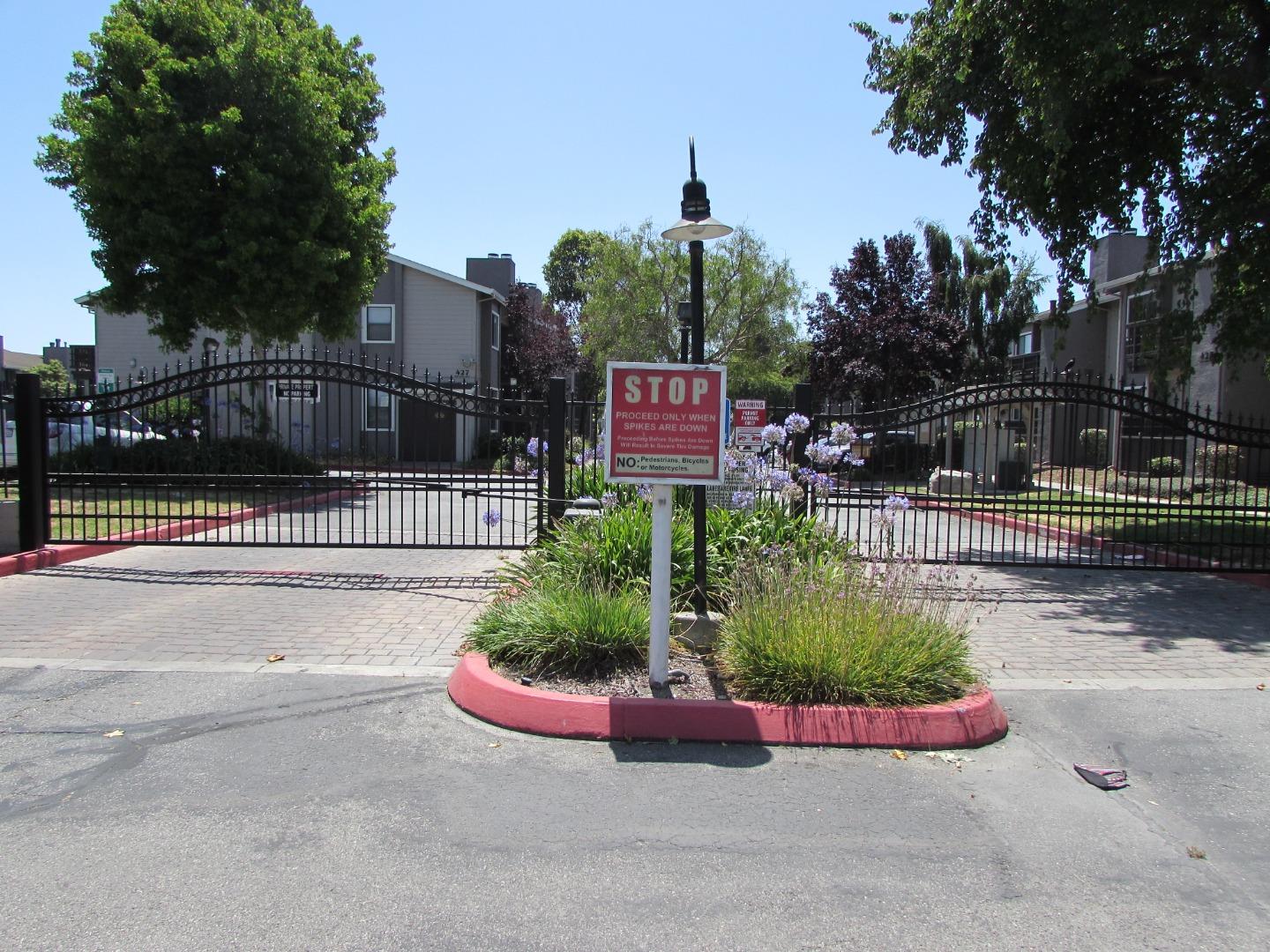 409 Tyler Place, Unit B Salinas, CA 93906 - Photo 22 of 25 a sign that is sitting in front of a house