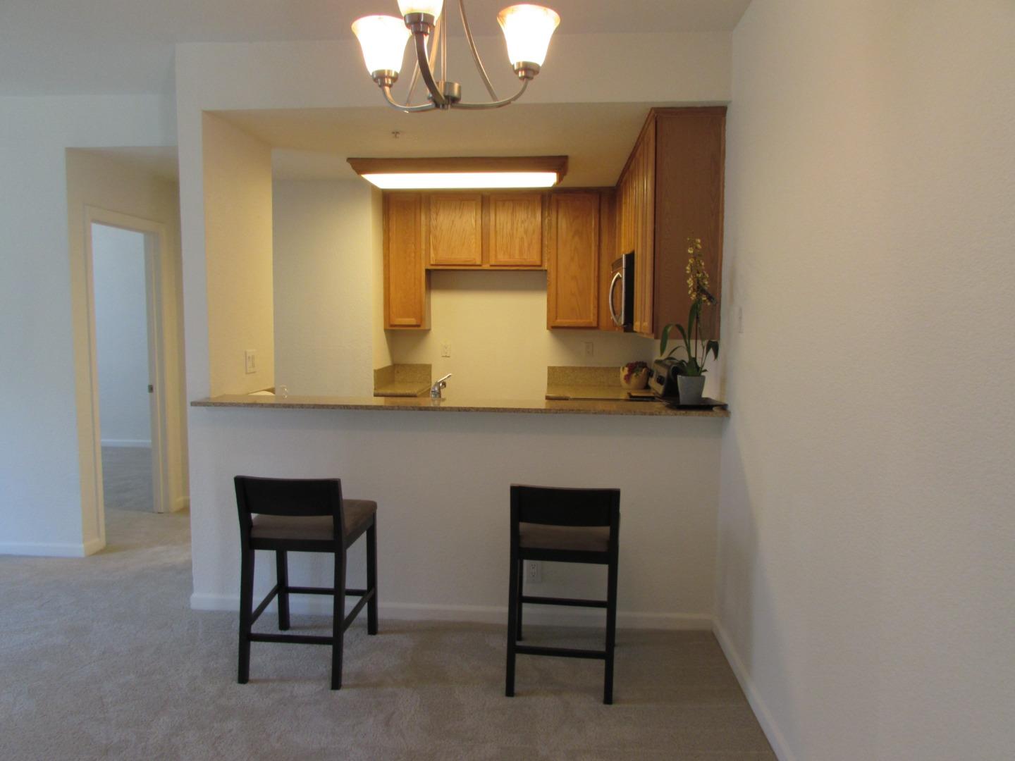409 Tyler Place, Unit B Salinas, CA 93906 - Photo 6 of 25 a bathroom with a sink and a mirror
