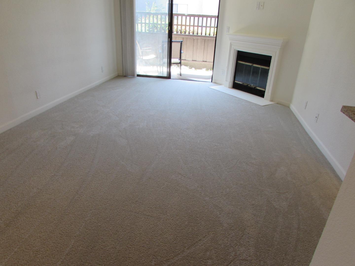 409 Tyler Place, Unit B Salinas, CA 93906 - Photo 8 of 25 a view of empty room with a fireplace