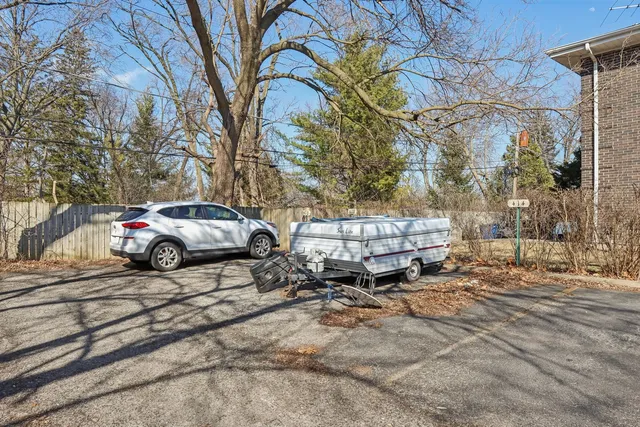 a view of a car parked on the side of the road