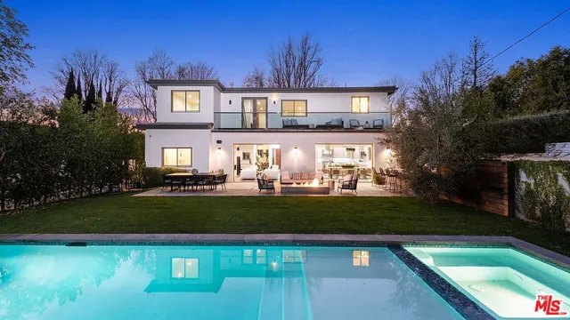 a view of a house with a swimming pool