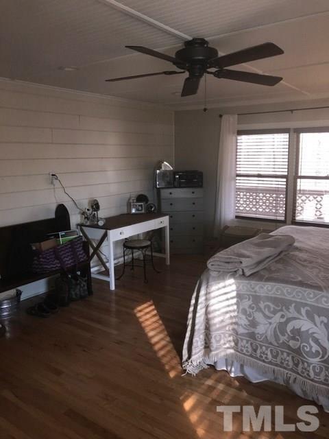 5349 Range Road Rougemont, NC 27572 - Photo 11 of 19 a bed room with a bed and a chair