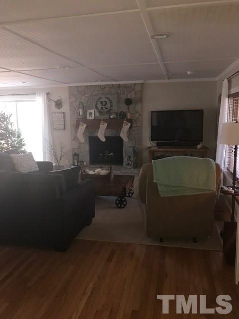 5349 Range Road Rougemont, NC 27572 - Photo 8 of 19 a living room with furniture and a flat screen tv