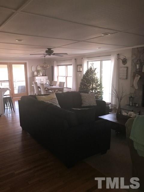 5349 Range Road Rougemont, NC 27572 - Photo 9 of 19 a view of a livingroom with furniture window and wooden floor