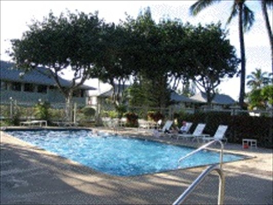 3830 Edward Road, Unit 11H Princeville, HI 96722 - Photo 4 of 14 a view of a house with backyard and sitting area