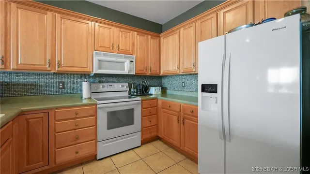 $450,000 | 1230 Lands End Parkway, Unit 304, Osage Beach, MO 65065