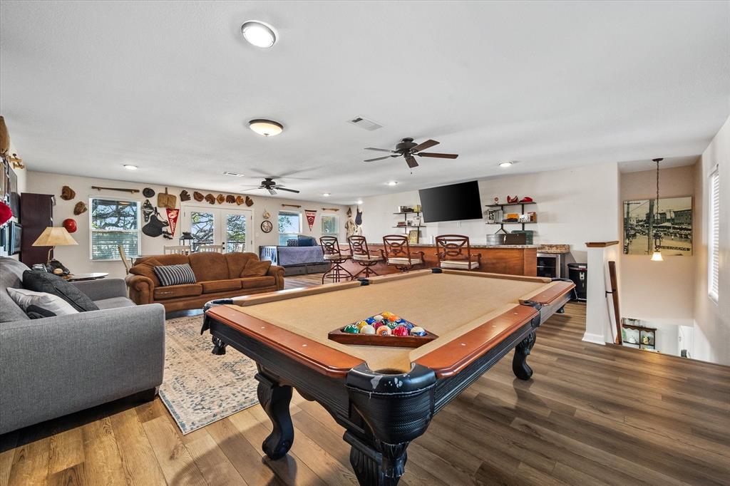226 Palisade Loop Mabank, TX 75156 - Photo 17 of 40 a living room with lots of furniture and view of kitchen