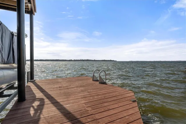a view of a balcony with an ocean