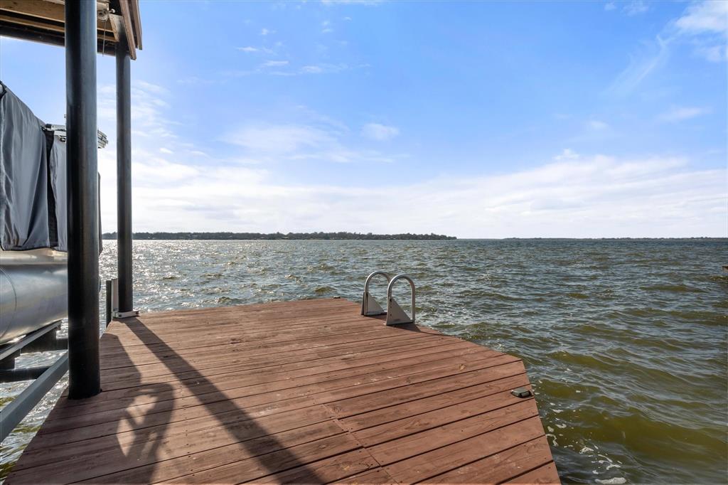 226 Palisade Loop Mabank, TX 75156 - Photo 30 of 40 a view of a balcony with an ocean