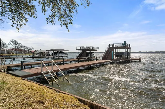 a view of a roof deck with chairs