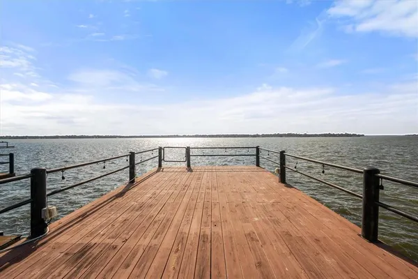 a view of outdoor space with wooden floor