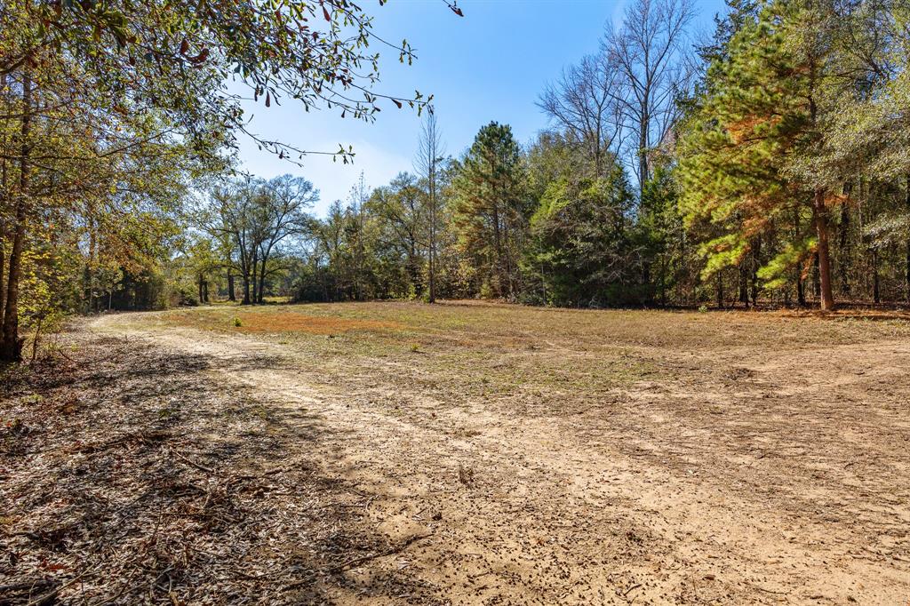 24142 Interstate 20 West Lindale, TX 75771 - Photo 8 of 12 a view of an white house with a yard