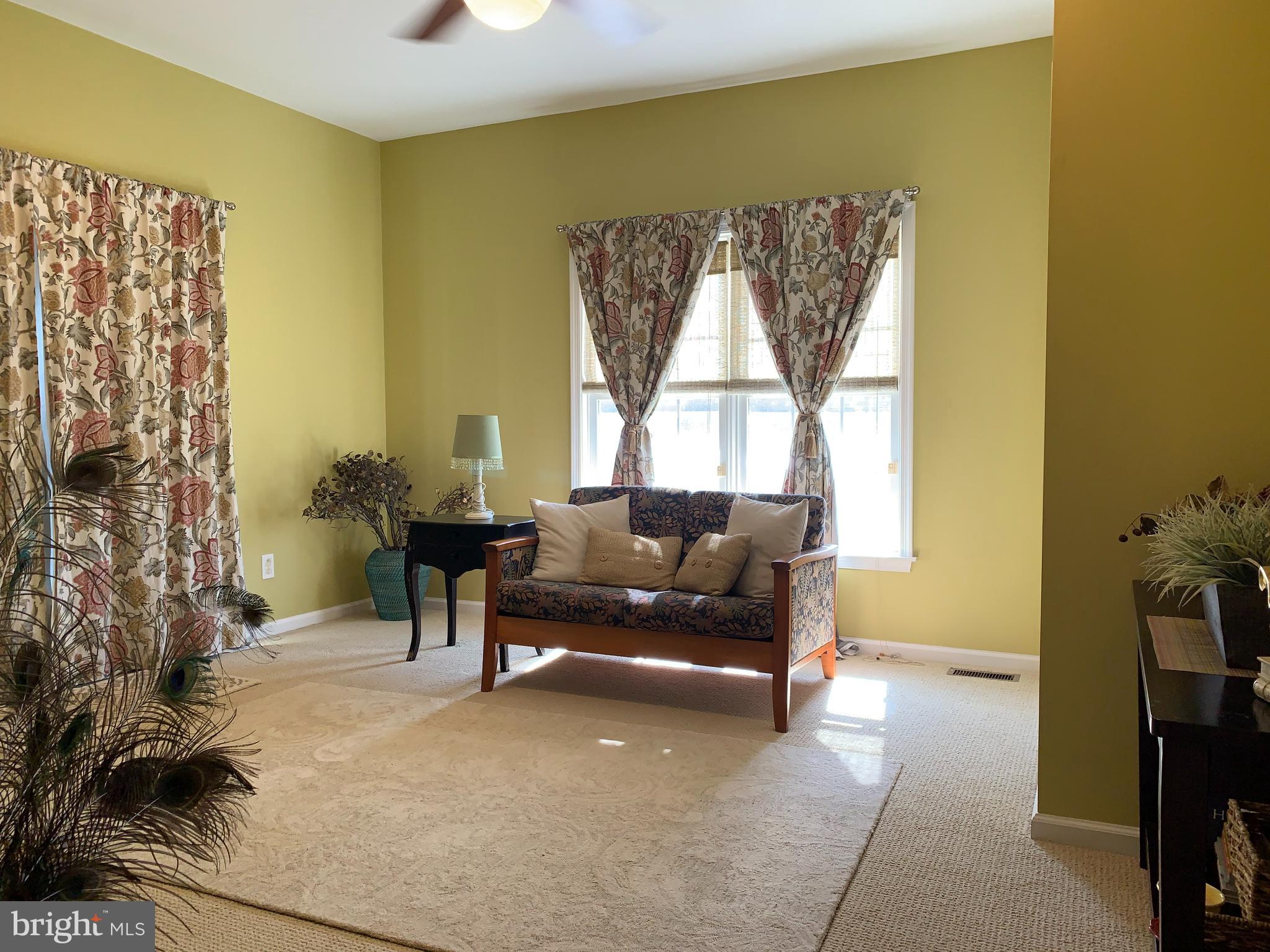 163 Sharon Station Road Robbinsville, NJ 08691 - Photo 11 of 38 a living room with furniture and a window