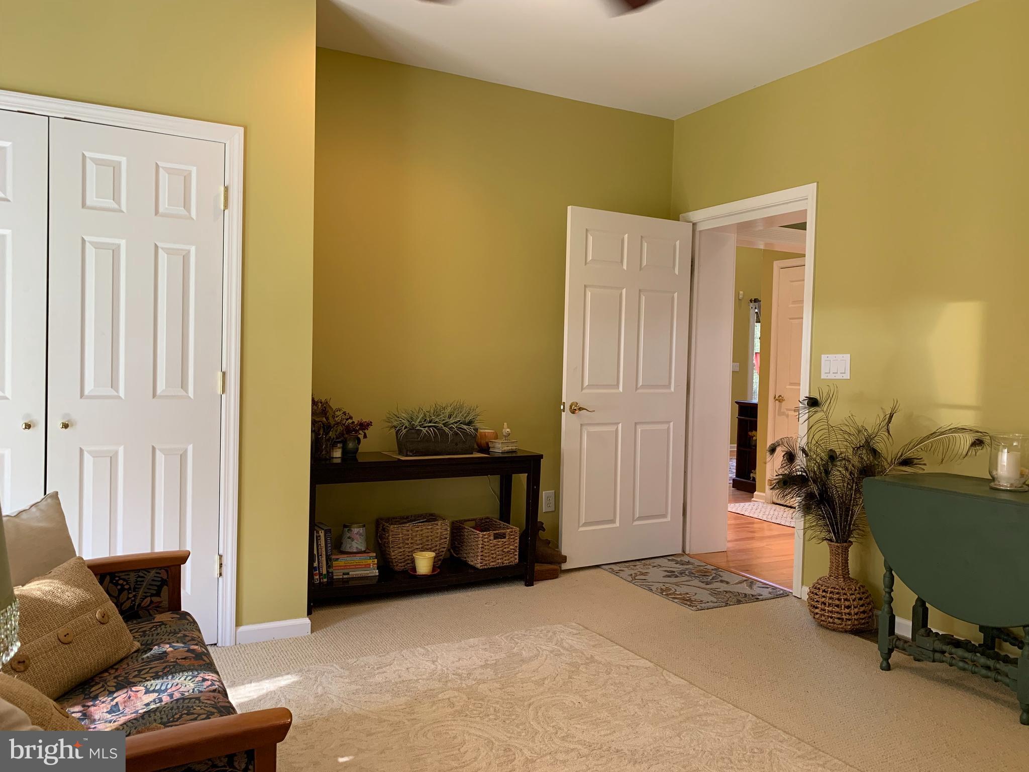 163 Sharon Station Road Robbinsville, NJ 08691 - Photo 12 of 38 a living room with furniture and a couch