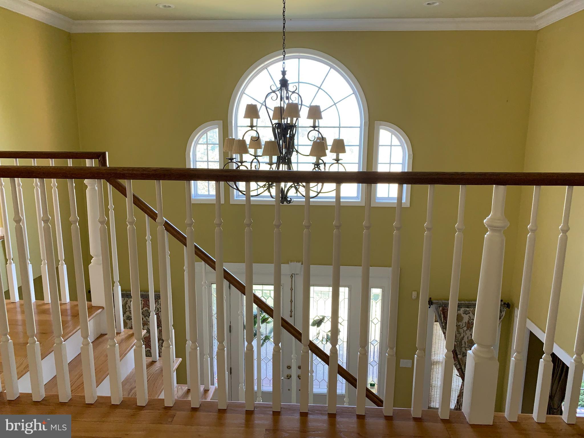 163 Sharon Station Road Robbinsville, NJ 08691 - Photo 23 of 38 a view of staircase with railing and a window