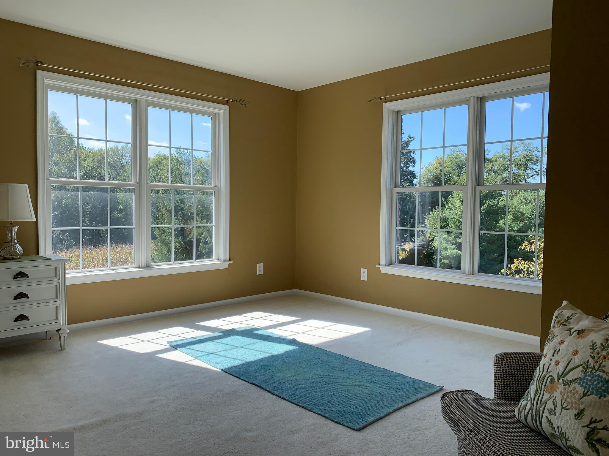 163 Sharon Station Road Robbinsville, NJ 08691 - Photo 27 of 38 a bed sitting in a bedroom next to a window