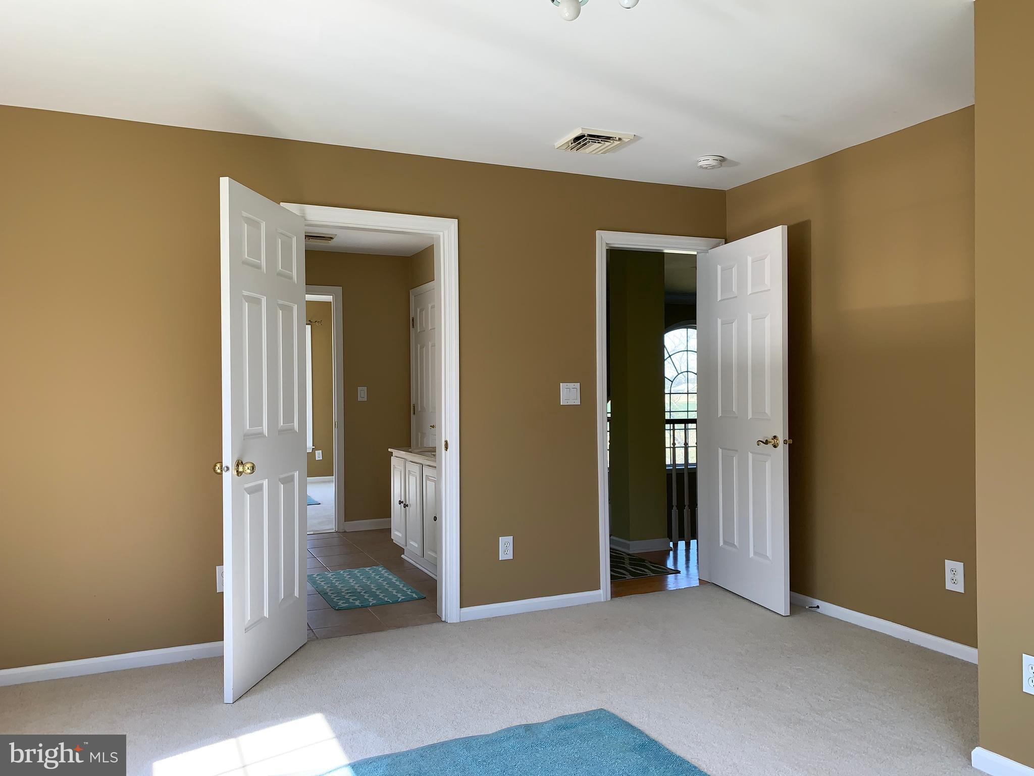 163 Sharon Station Road Robbinsville, NJ 08691 - Photo 31 of 38 an empty room with closet and a bathroom