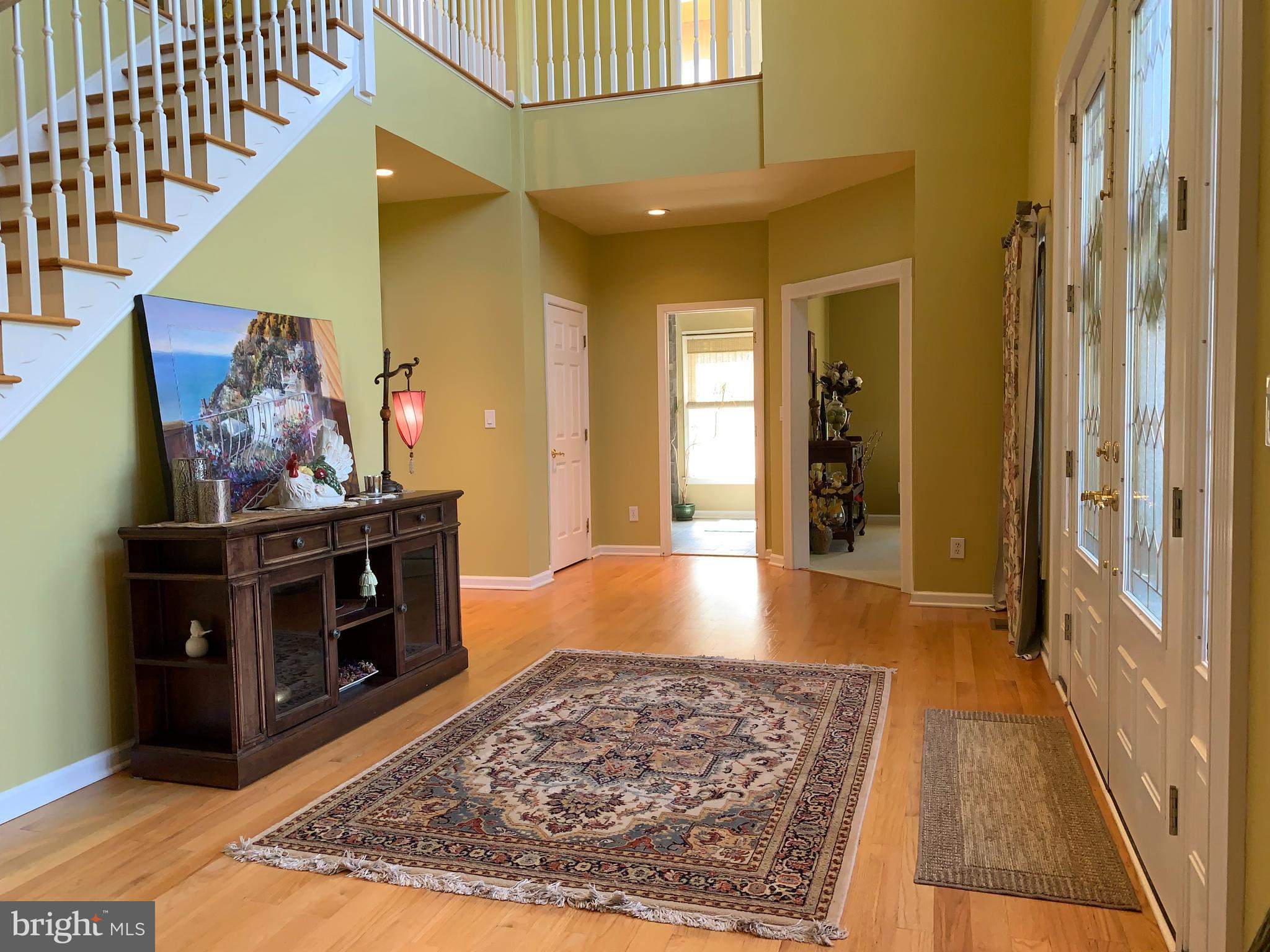 163 Sharon Station Road Robbinsville, NJ 08691 - Photo 4 of 38 a living room with furniture and a fireplace