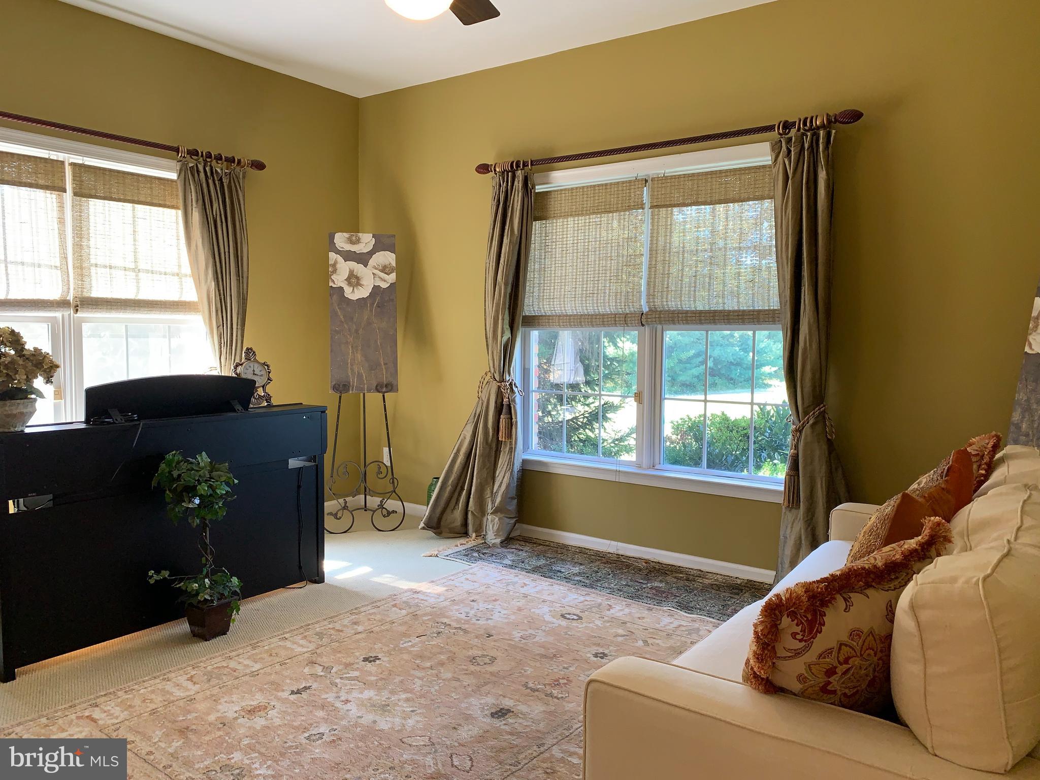 163 Sharon Station Road Robbinsville, NJ 08691 - Photo 7 of 38 a living room with furniture and a window