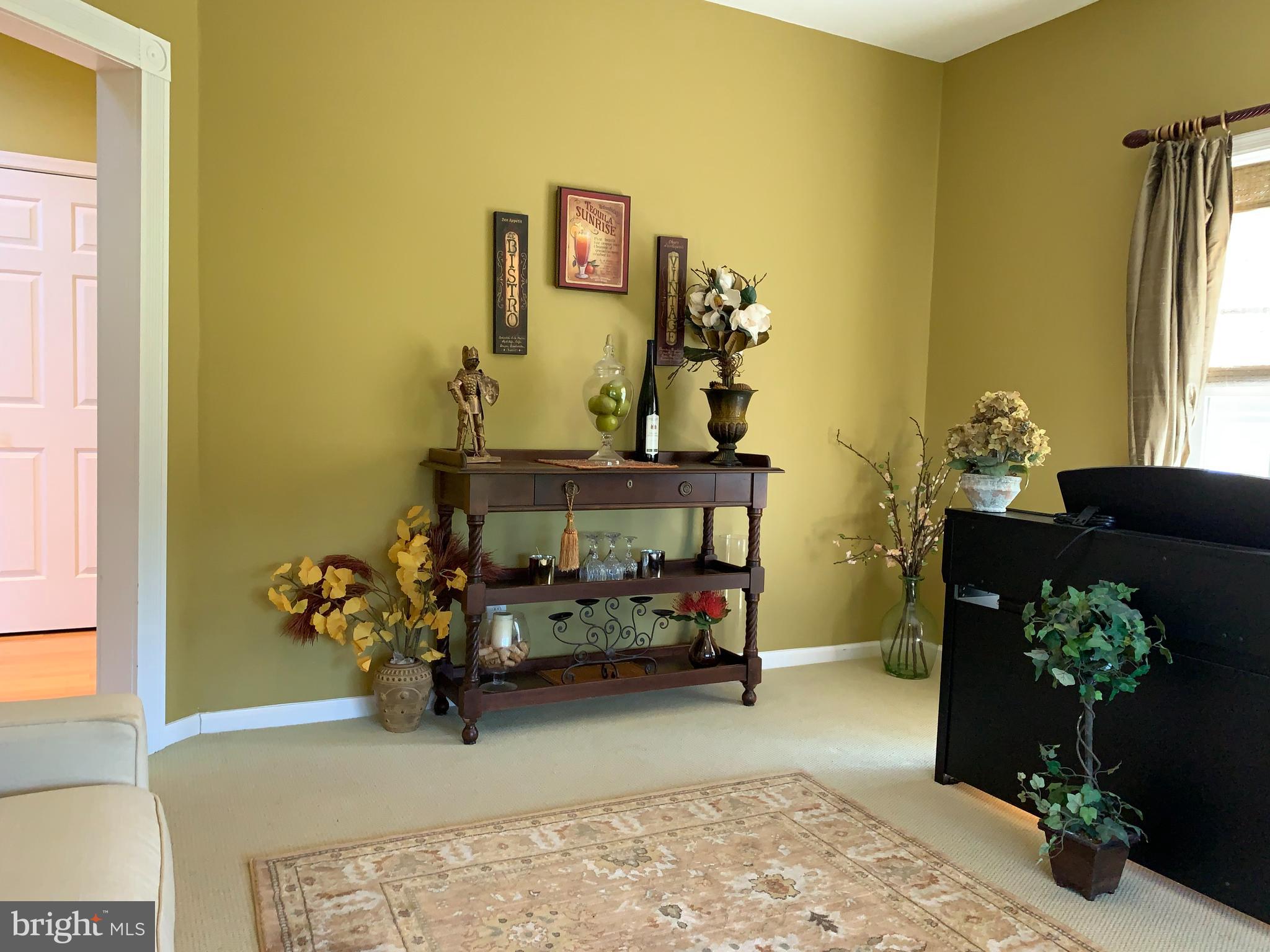 163 Sharon Station Road Robbinsville, NJ 08691 - Photo 8 of 38 a living room with furniture and a potted plant