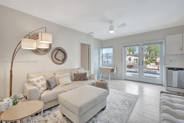 a living room with furniture and a chair