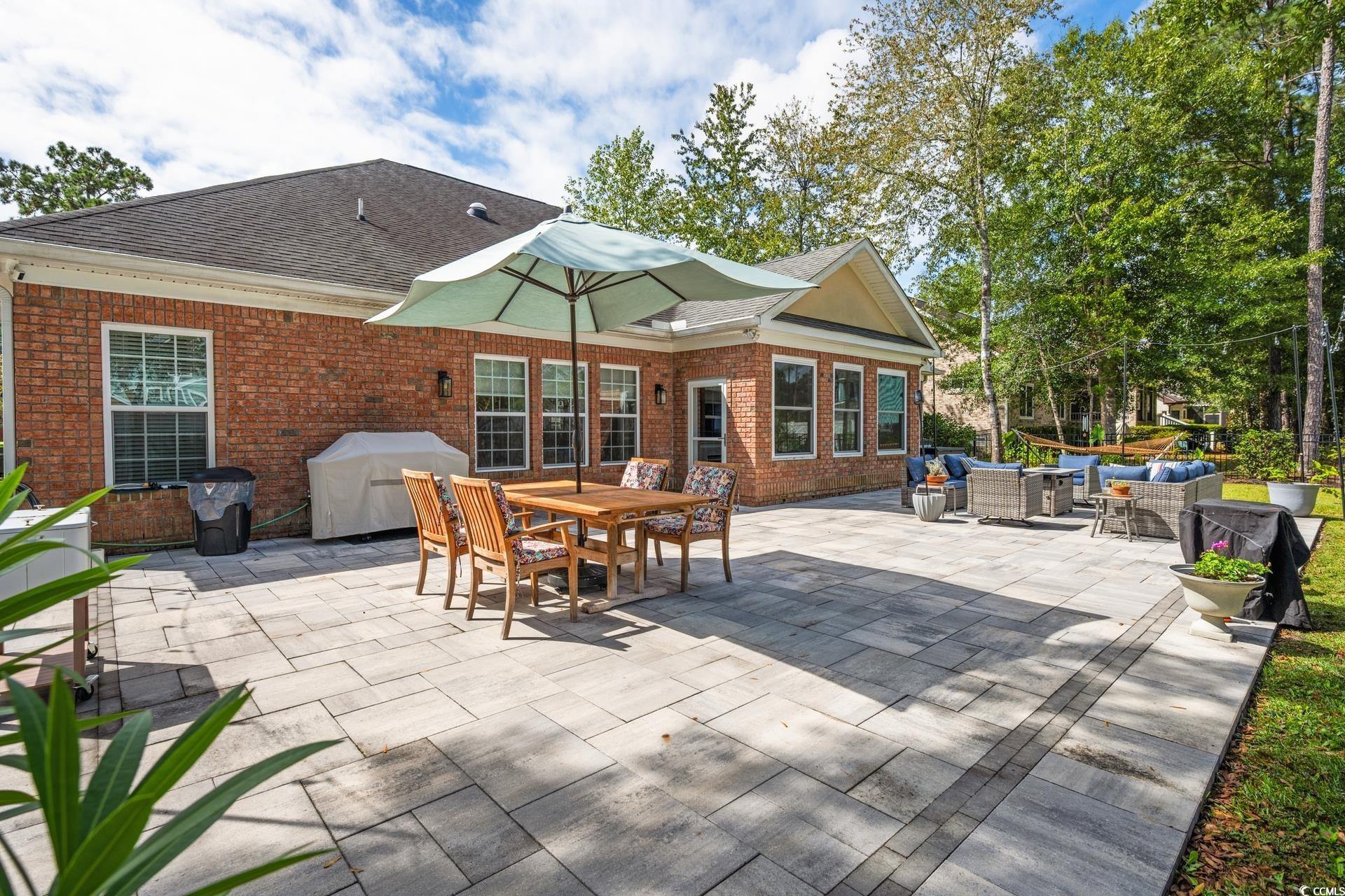 2073 Timmerman Road Myrtle Beach, SC 29588 - Photo 23 of 34 View of patio / terrace featuring an outdoor living space, outdoor dining area, and grilling area