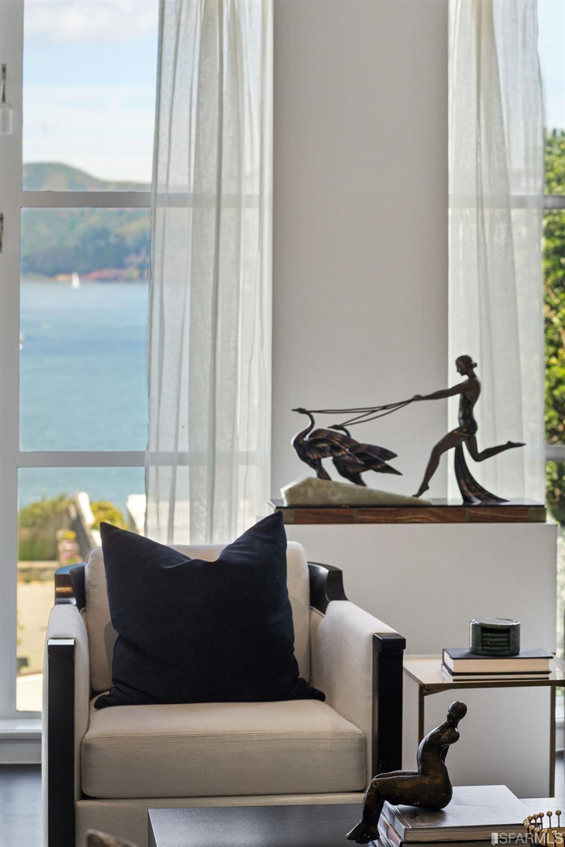 135 Sea Cliff Avenue San Francisco, CA 94121 - Photo 11 of 69 a living room with furniture and a window