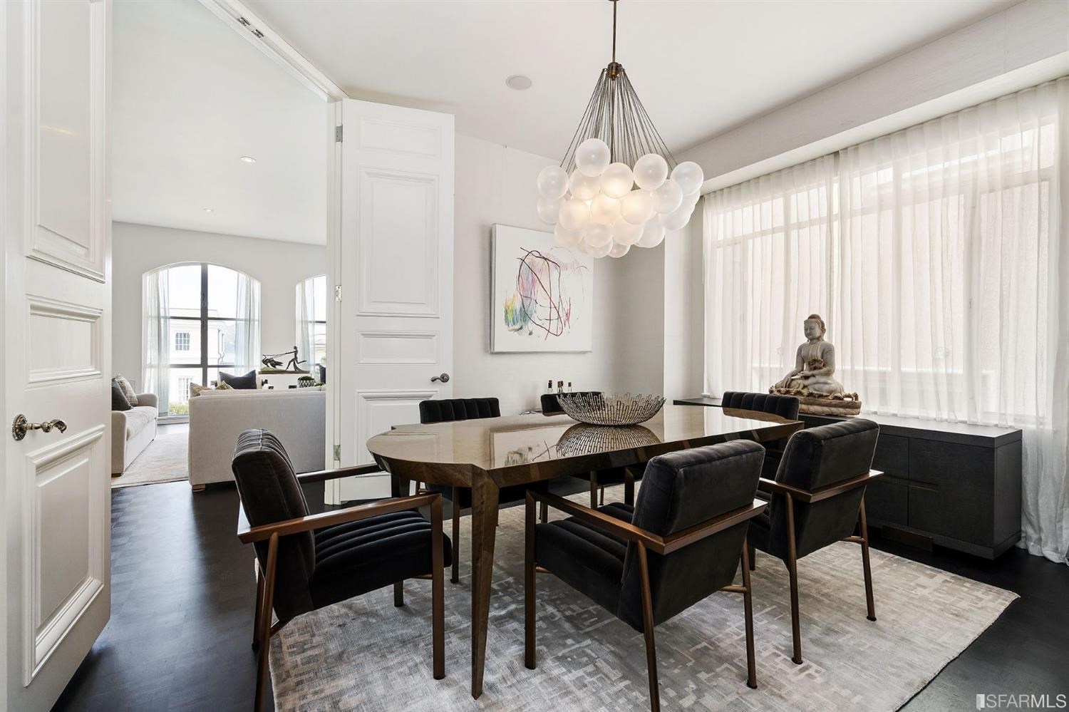 135 Sea Cliff Avenue San Francisco, CA 94121 - Photo 16 of 69 a view of a dining room with furniture window and wooden floor