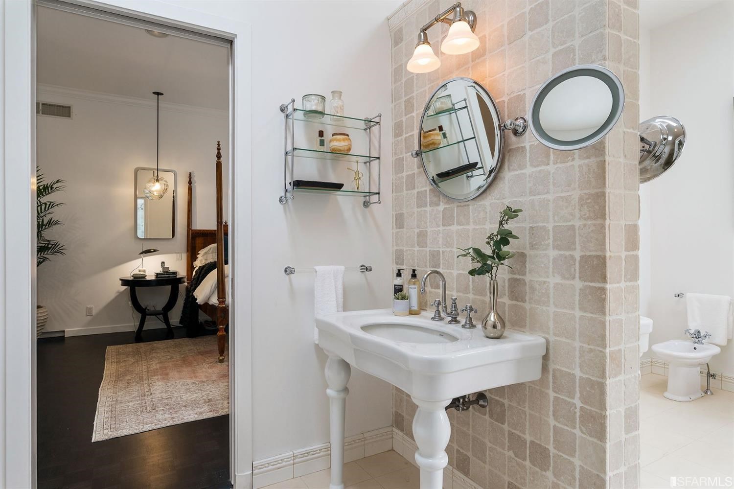 135 Sea Cliff Avenue San Francisco, CA 94121 - Photo 32 of 69 a bathroom with a sink a toilet and a mirror