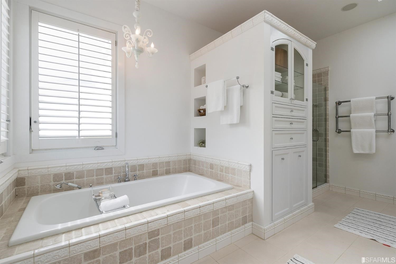 135 Sea Cliff Avenue San Francisco, CA 94121 - Photo 38 of 69 a bath tub sitting next to a bathroom sink