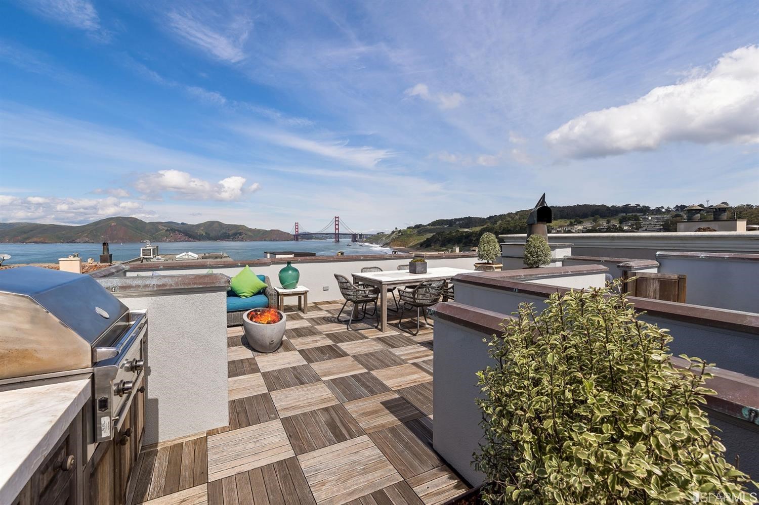 135 Sea Cliff Avenue San Francisco, CA 94121 - Photo 44 of 69 a view of a chairs and table in a terrace