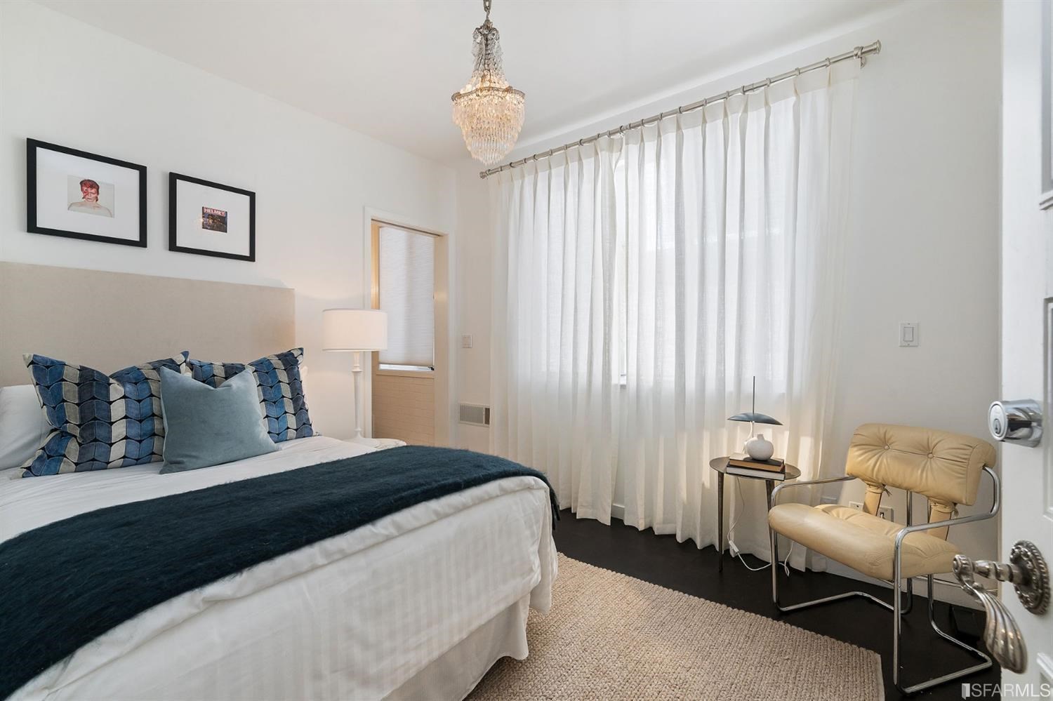 135 Sea Cliff Avenue San Francisco, CA 94121 - Photo 49 of 69 a bedroom with a bed and a chair