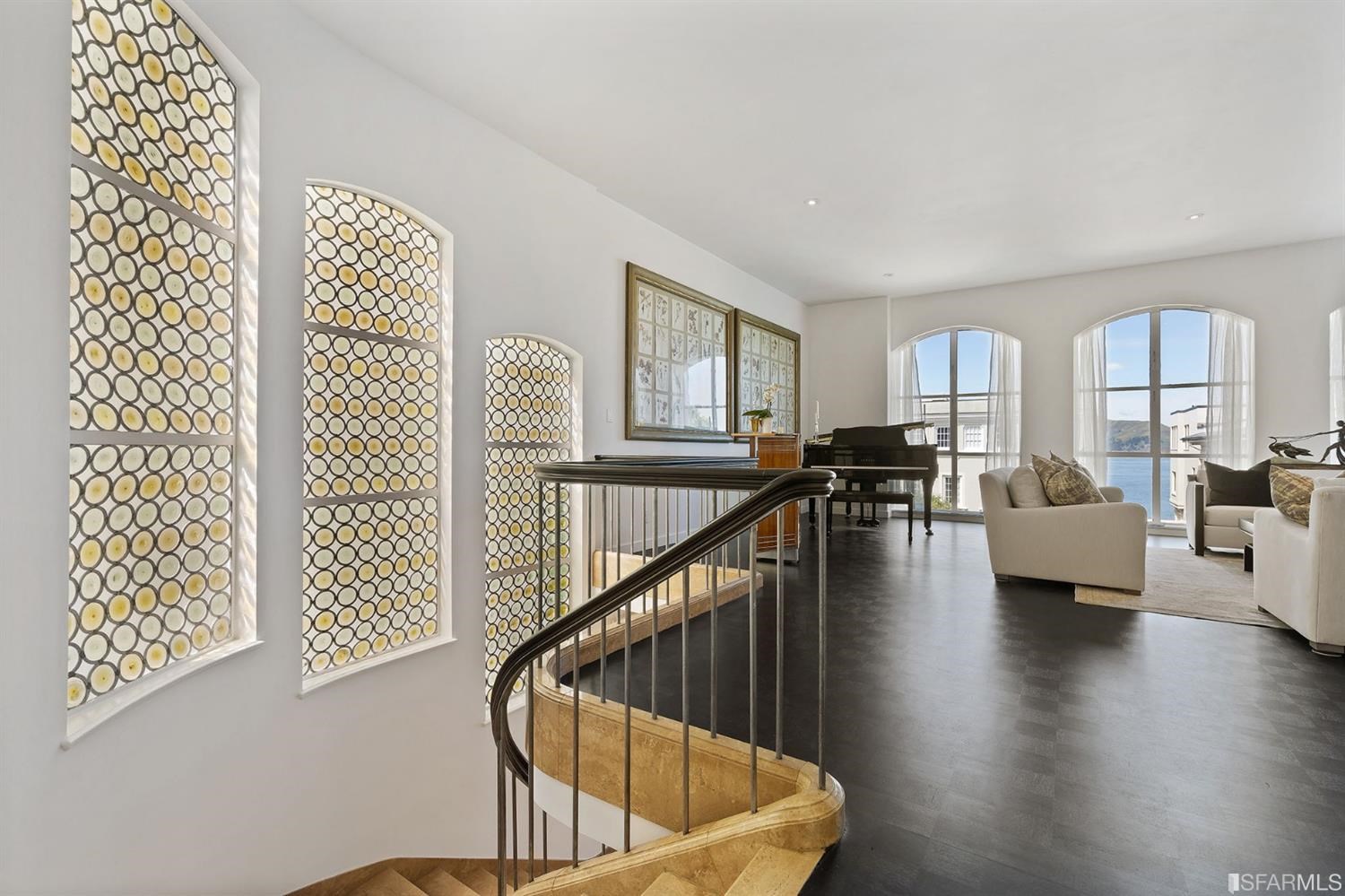 135 Sea Cliff Avenue San Francisco, CA 94121 - Photo 6 of 69 a view of living room and dining room with wooden floor