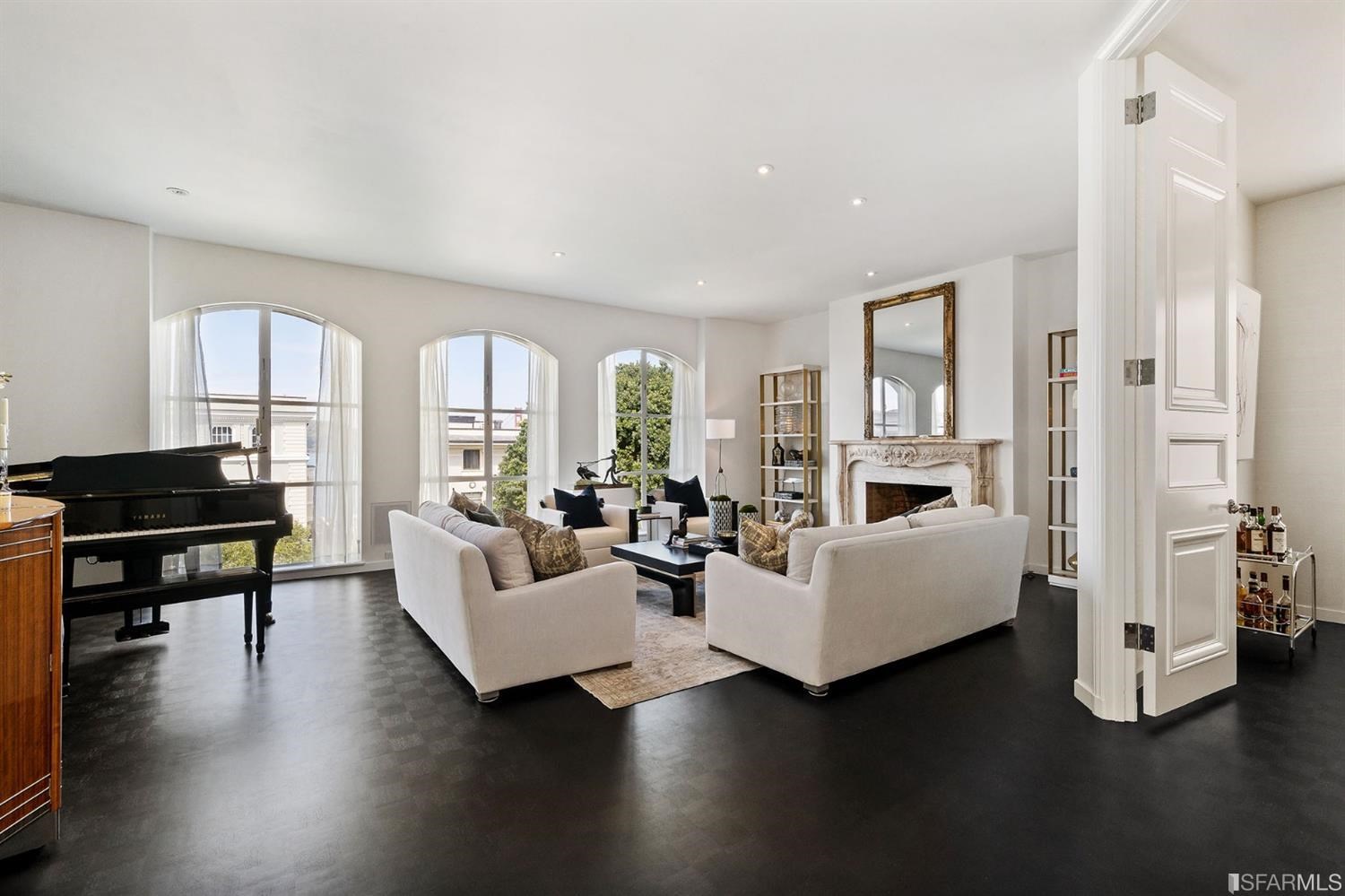 135 Sea Cliff Avenue San Francisco, CA 94121 - Photo 7 of 69 a living room with fireplace furniture and a wooden floor