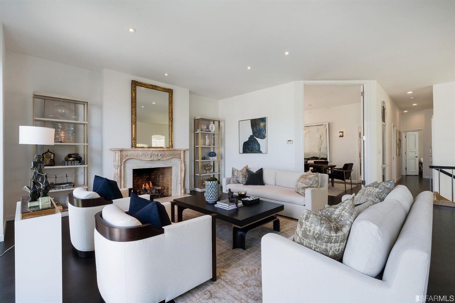 135 Sea Cliff Avenue San Francisco, CA 94121 - Photo 9 of 69 a living room with furniture and a fireplace