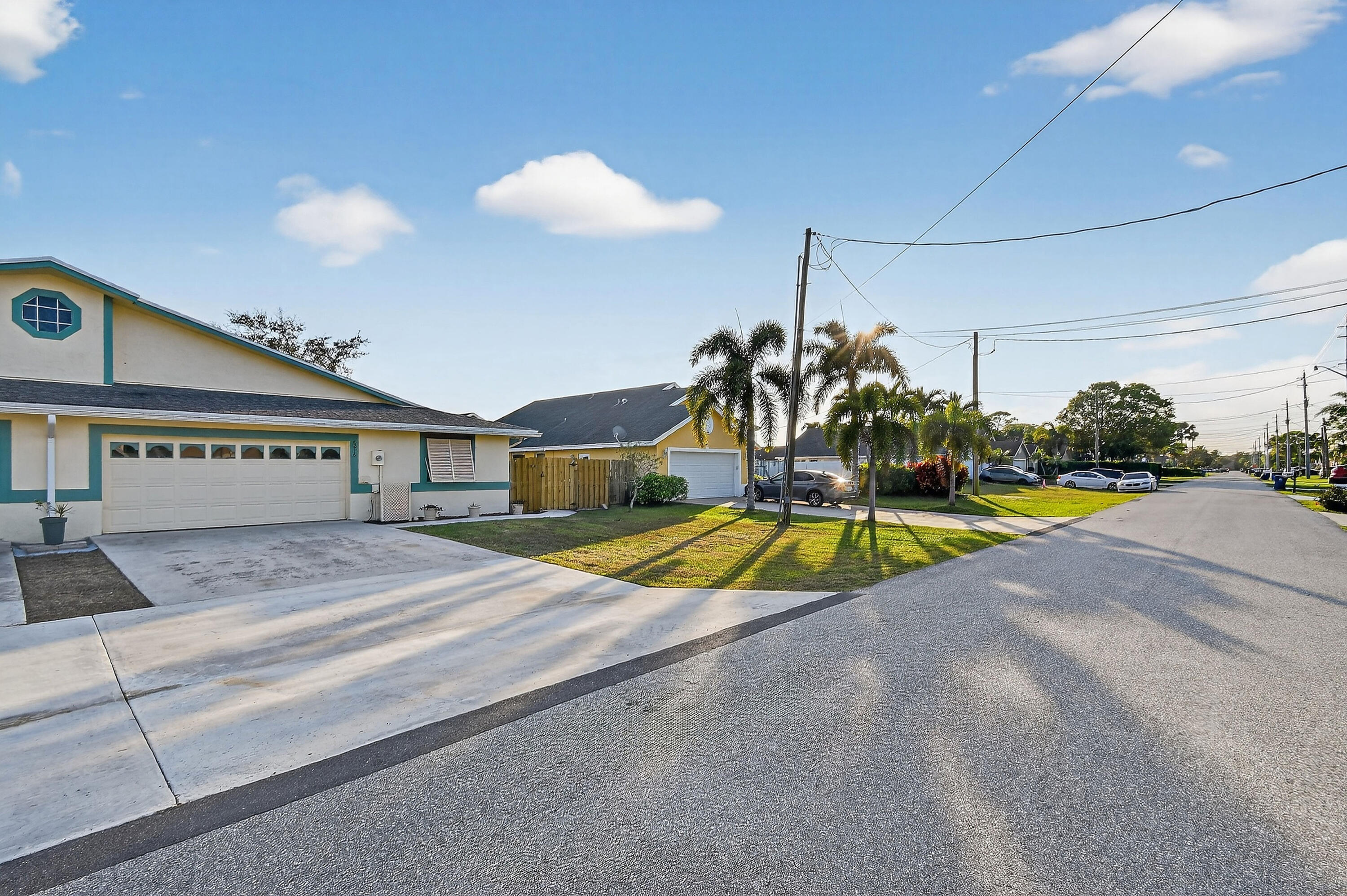 6016 Pompano Street Jupiter, FL 33458 - Photo 3 of 44 Street view
