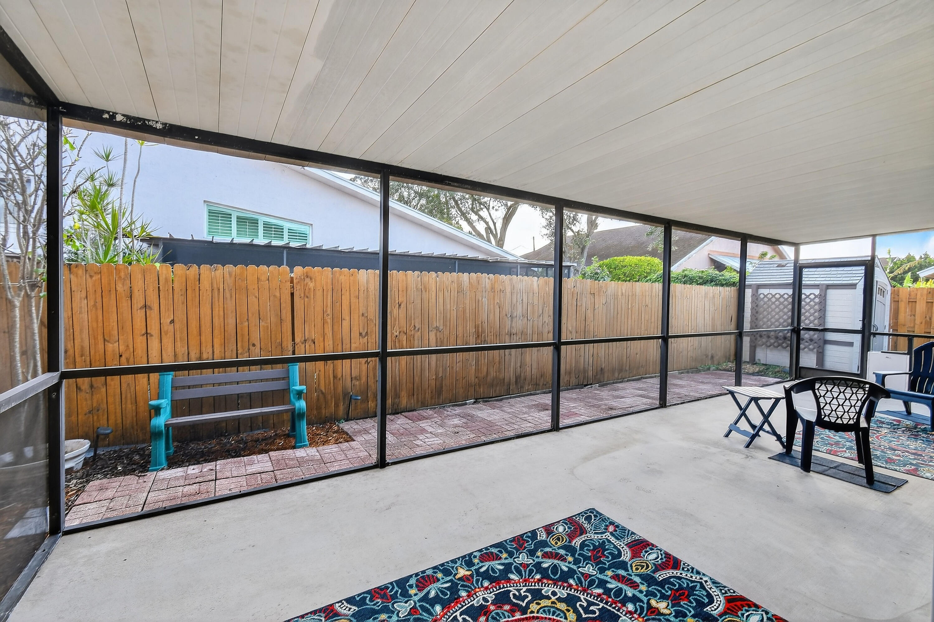 6016 Pompano Street Jupiter, FL 33458 - Photo 40 of 44 Screened Porch