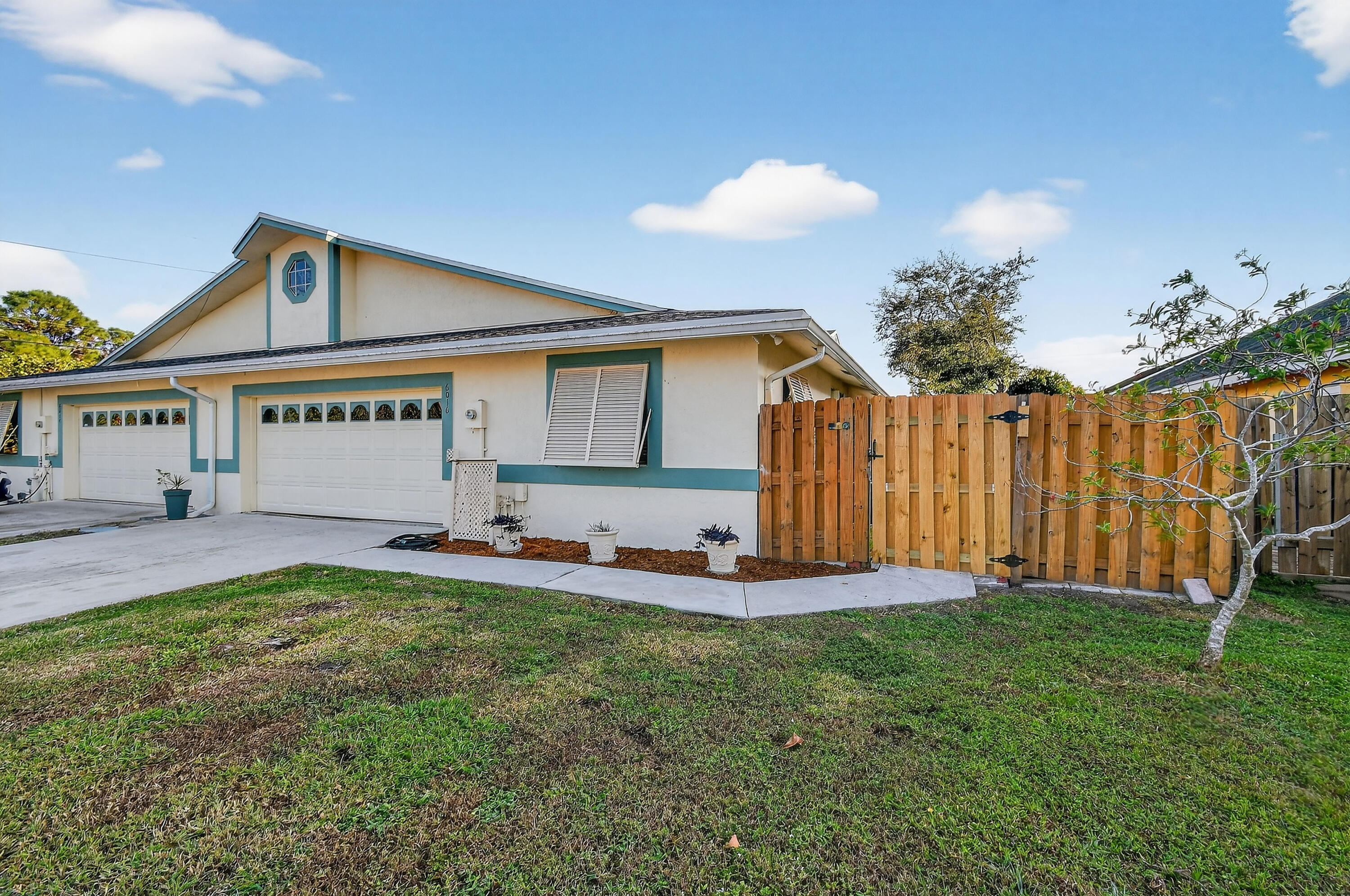 6016 Pompano Street Jupiter, FL 33458 - Photo 4 of 44 Side Elevation