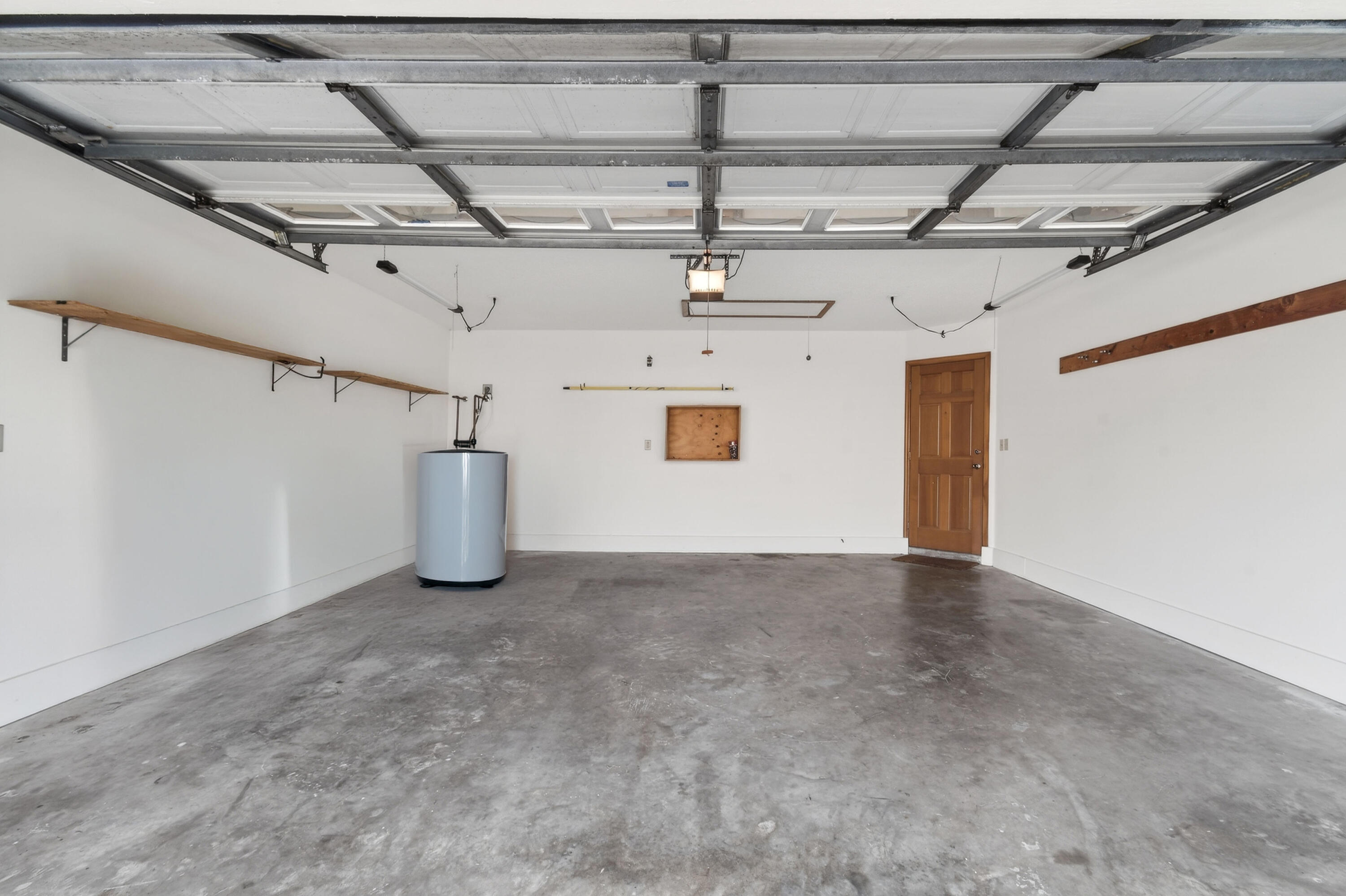 6016 Pompano Street Jupiter, FL 33458 - Photo 44 of 44 2 car garage