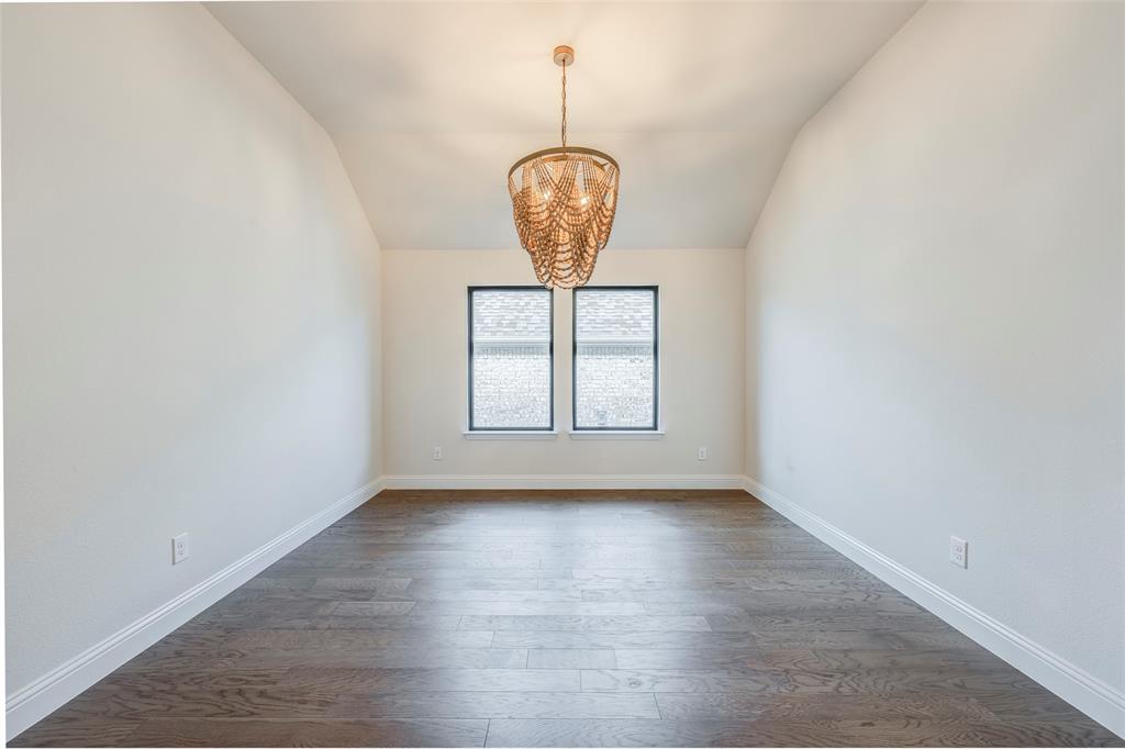 14304 Spitfire Trail Fort Worth, TX 76262 - Photo 8 of 31 a front view of a livingroom with a window and chandelier