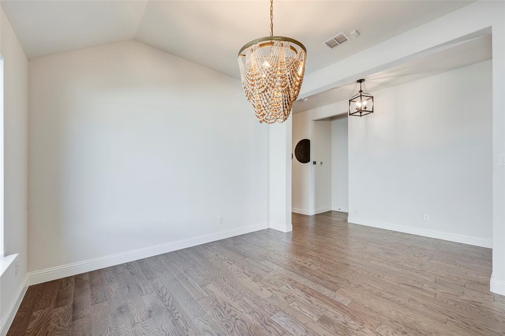 14304 Spitfire Trail Fort Worth, TX 76262 - Photo 9 of 31 a view of an entryway with wooden floor